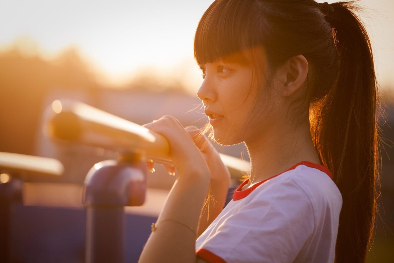 A teen girl in the sun.