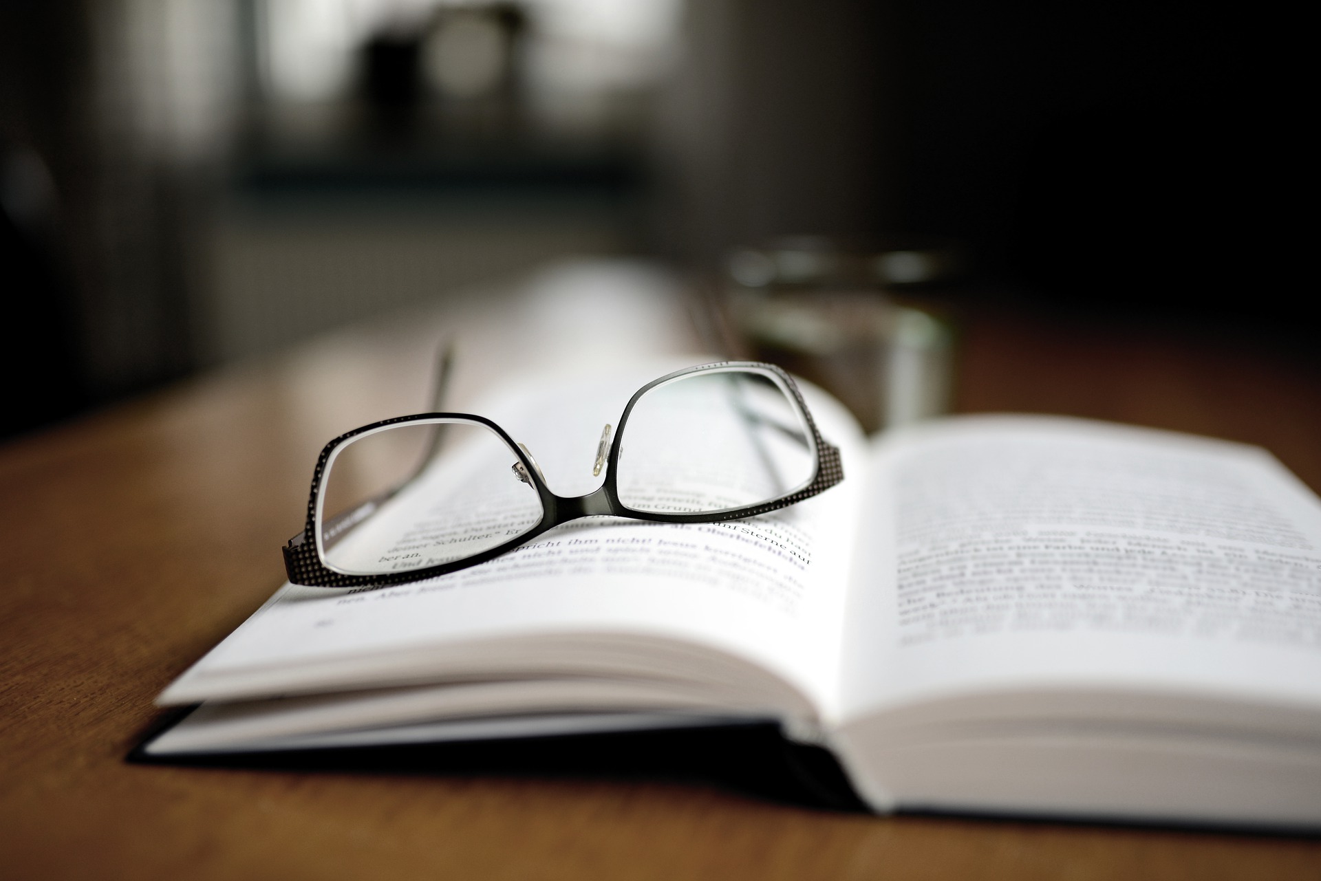 A book and glasses.